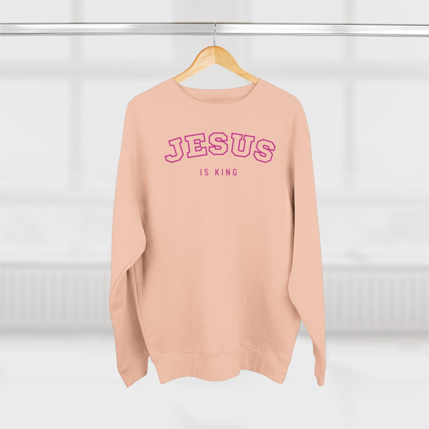 Jesus is King – (Varsity-style font) Women's Premium Sweatshirt