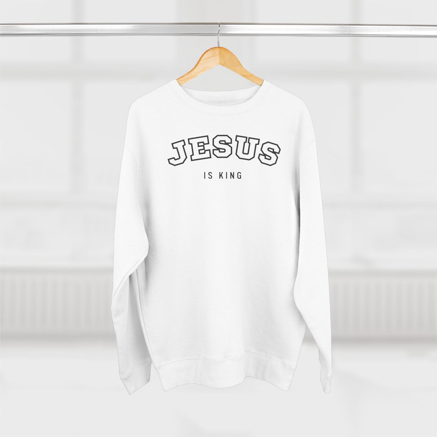 Jesus is King – (Varsity-style font) Women's Premium Sweatshirt