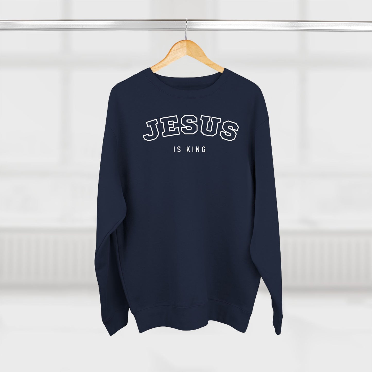 Jesus is King  – (Varsity-style font) Men's Premium Sweatshirt